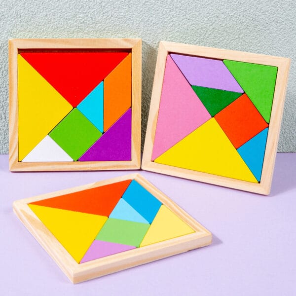 Three colorful wooden tangram puzzles in square frames. Montessori learning toy for toddlers.