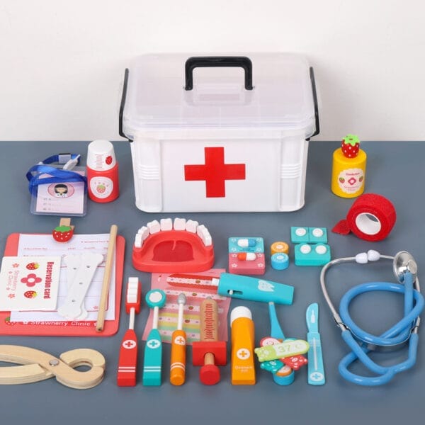 Trousse de médecin en bois pour enfants ; comprend un stéthoscope, des outils et une trousse de premiers secours. Un jouet idéal pour les jeux de rôle.