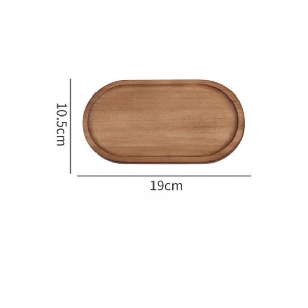 Hochwertiges ovales Holztablett (19cm x 10,5cm) aus Massivholz.