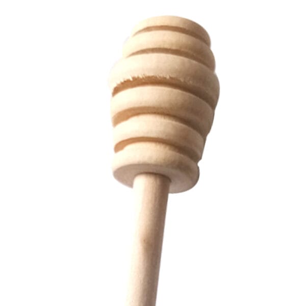 Honiglöffel aus Holz, Nahaufnahme. Hochwertiger Honigrührer für den praktischen Gebrauch.