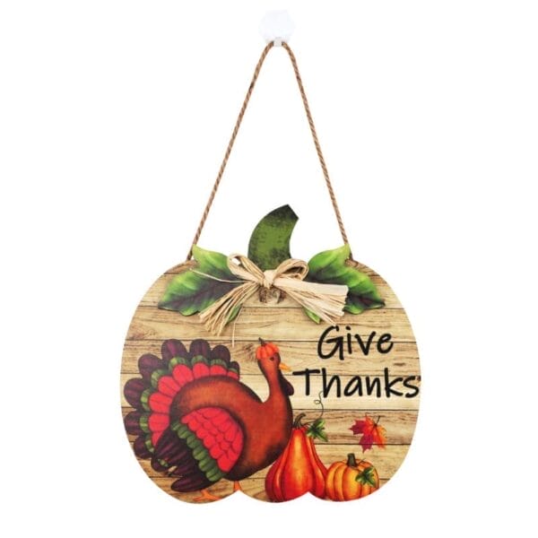 Thanksgiving-Holzschild in Kürbisform mit einem Truthahn und den Worten „Give Thanks“.