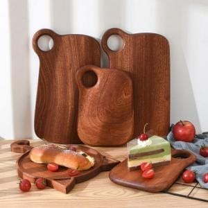 Set aus eleganten Schneidebrettern aus Ebenholz, perfekt zum Servieren oder Schneiden. Küchenbrett aus Ebenholz.