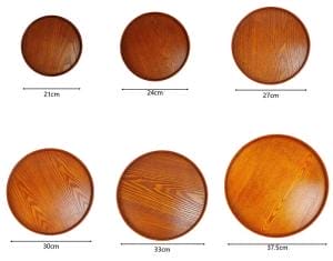 Verschiedene Größen runde Holz Tabletts, japanische Servierplatten aus Erlenholz.