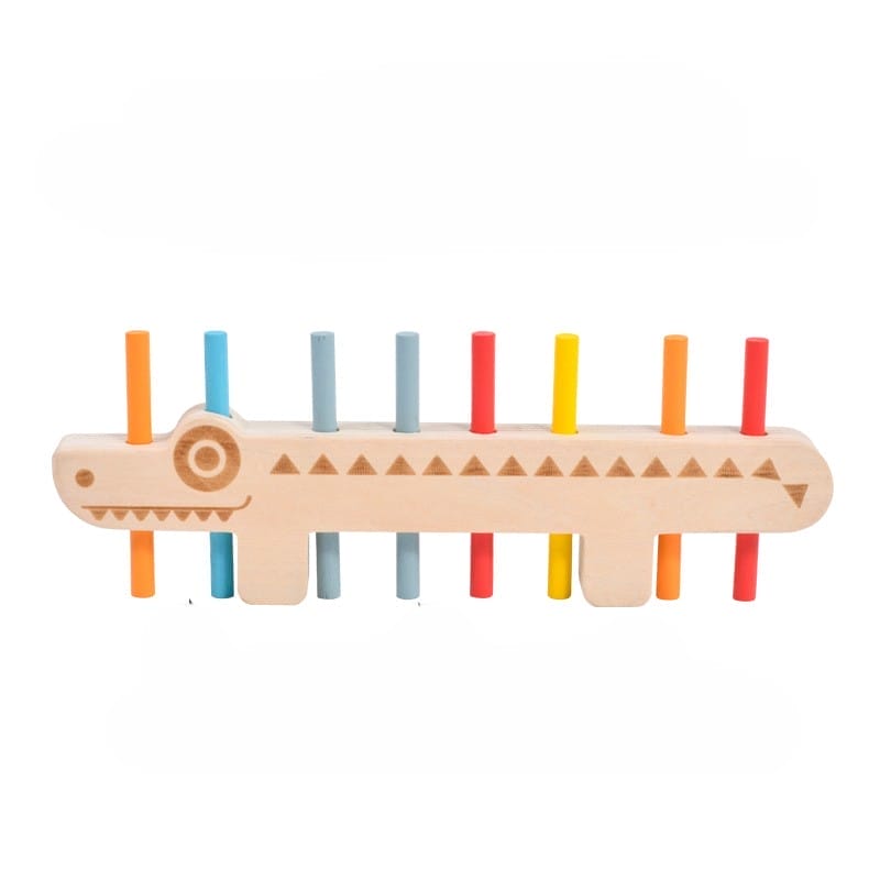 Alligator-Spielzeug aus Holz mit bunten Stiften, Sortierspiel im Montessori-Stil.