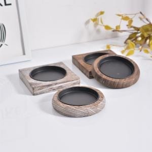Rustikale Kerzenuntersetzer aus Holz, verschiedene Formen. Kerzenteller Holz Großhandel.