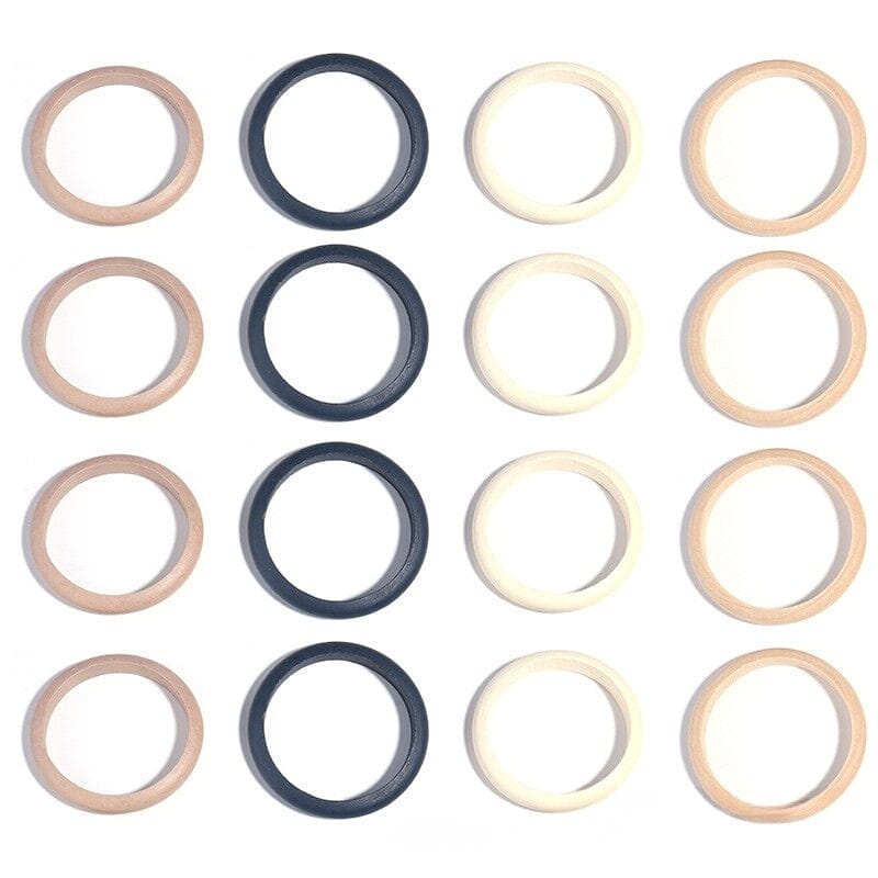 Bunte Holzarmreifen im Großhandel: Vintage Holzarmbänder in Beige, Schwarz und Weiß.