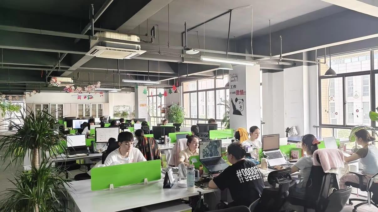 Modern open office space with employees at work