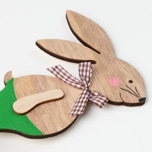 Osterdeko Holz Hase: Holzfigur mit Schleife, ideal für Osterdekoration.