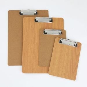 Colorful sticky notes stacked, workspace organization concept.